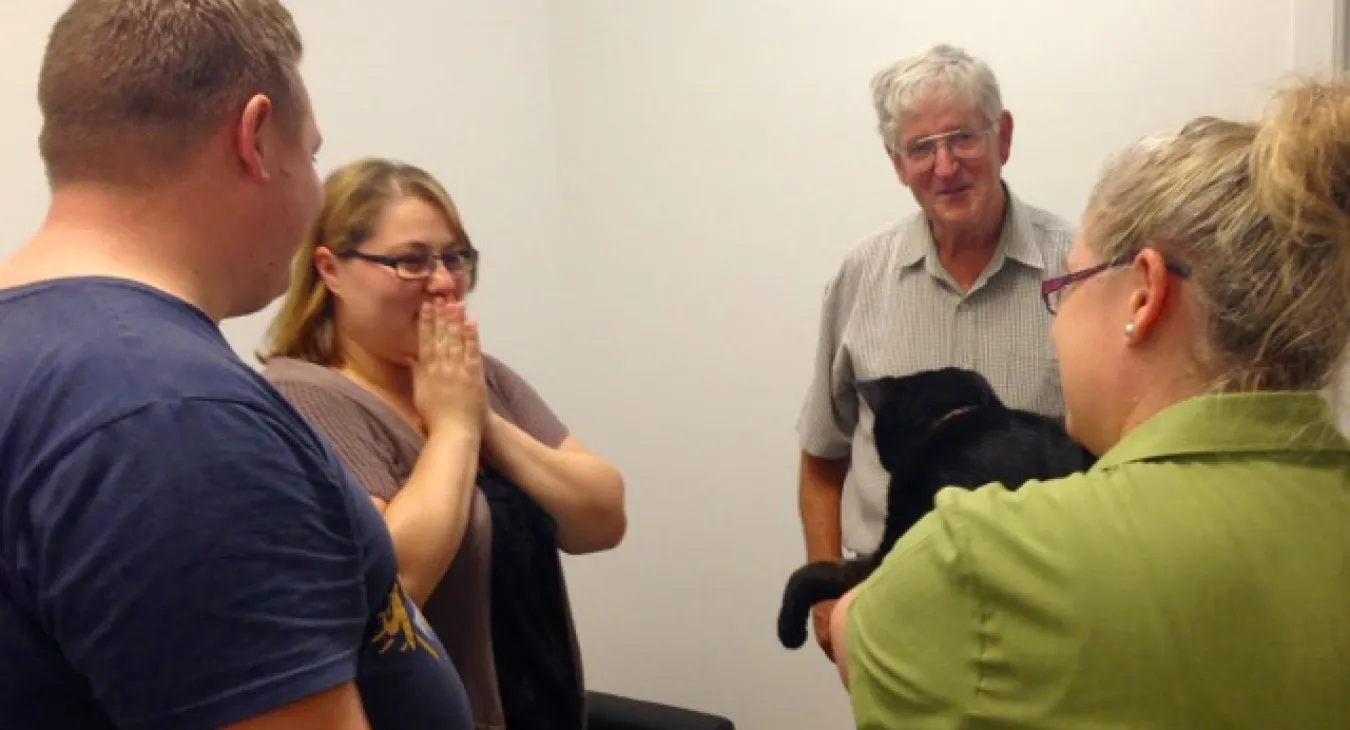 the moment a cat owner is reunited with their lost cat